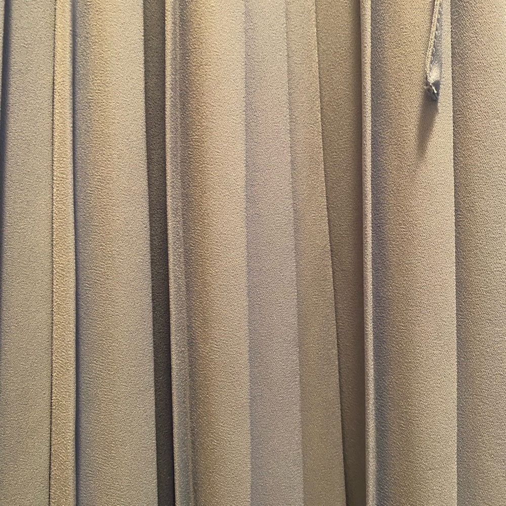 Baby blue Banana Republic pleated, elastic waist skirt. Goes below the knee.